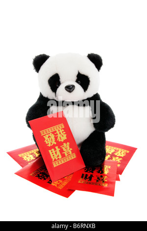 Panda di peluche con Lucky Money buste Foto Stock