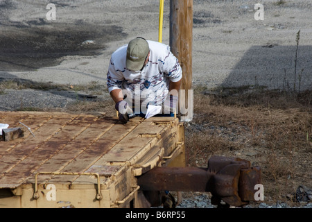 Interruttore uomo corse su nolo auto viene commutato in Rigby cantiere ferroviario sud mi Portland Maine STATI UNITI D'AMERICA Foto Stock