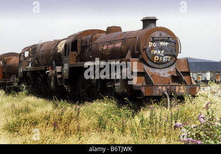 Motori a vapore a Woodham scrapyard su Barry Island in Galles del Sud Foto Stock