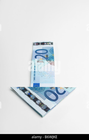 Freccia fatta di denaro Foto Stock
