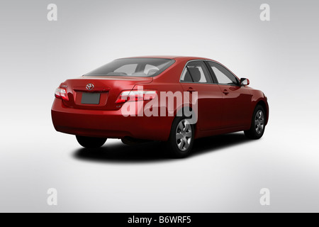 2009 Toyota Camry LE I4 in rosso - angolo posteriore vista Foto Stock