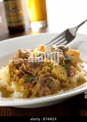 Le polpette di carne, pancetta e mash Foto Stock