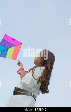 7 anno vecchia ragazza con kite, Winnipeg, Manitoba, Canada Foto Stock