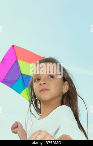 7 anno vecchia ragazza con kite, Winnipeg, Canada Foto Stock