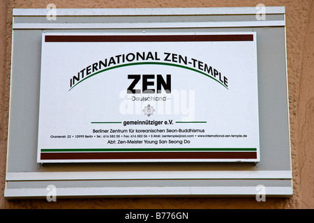 Segno sulla parete della International ZEN-tempio a Berlino, Germania, Europa Foto Stock