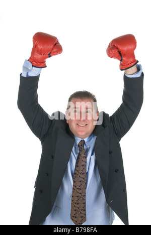 Un imprenditore ha sollevato le sue braccia nella vittoria durante i negoziati di contratto Foto Stock