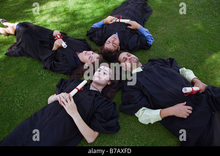 Laureati fantasticando Foto Stock