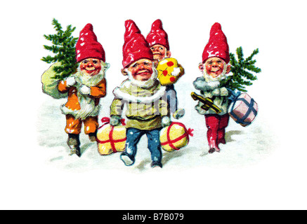 Nani mettendo in salamoia i regali a Natale Foto Stock