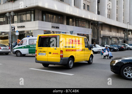 DHL delivery truck street Berlino Germania Foto Stock