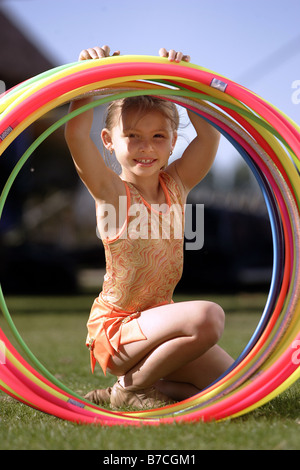 Americus Wilson, 6 anno vecchio hula hoop hulahoop star al suo genitore il circus in Nuova Zelanda Foto Stock