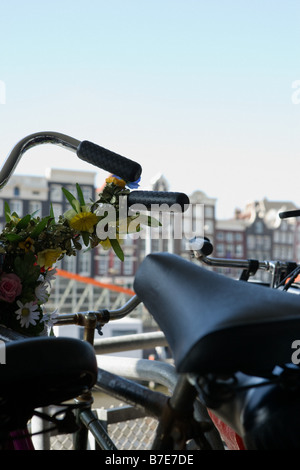 Biciclette in Amsterdam Foto Stock