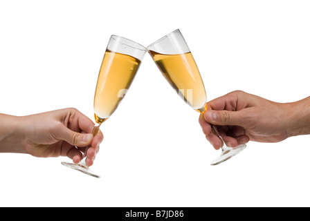 L uomo e la donna la tostatura champagne isolato su uno sfondo bianco Foto Stock