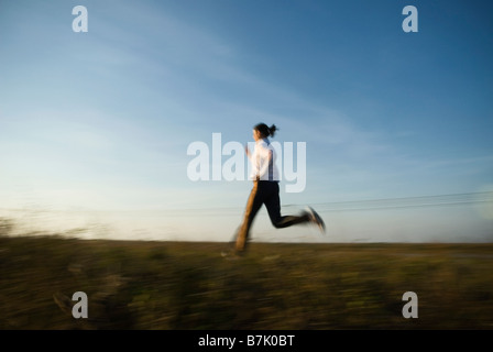 Femminile jogging in Everglades, lifestyle ritratto. Foto Stock