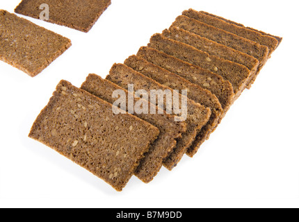 Fette di pane marrone vollkornbrot tedesco tutto il mais pane scuro chicco di mais derrata alimentare pane integrale di grano intero assortime Foto Stock