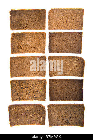 Fette di pane marrone vollkornbrot tedesco tutto il mais pane scuro chicco di mais derrata alimentare pane integrale di grano intero assortime Foto Stock