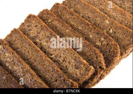 Fette di pane marrone vollkornbrot tedesco tutto il mais pane scuro chicco di mais derrata alimentare pane integrale di grano intero assortime Foto Stock