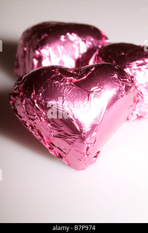 Gli amanti rosa a forma di cuore cioccolatini di san valentino il giorno di San Valentino la carta regalo chic kitsch foil Foto Stock