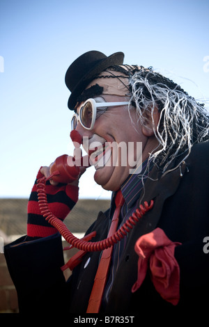 Clown presso il Grimaldi memoriale di servizio Dalston Londra Foto Stock