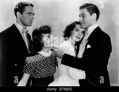 4 au paradis quattro una folla / quatre au paradis Anno: 1938 USA Errol Flynn, Olivia de Havilland, Rosalind Russell, Patric Knowles Direttore: Michael Curtiz Foto Stock