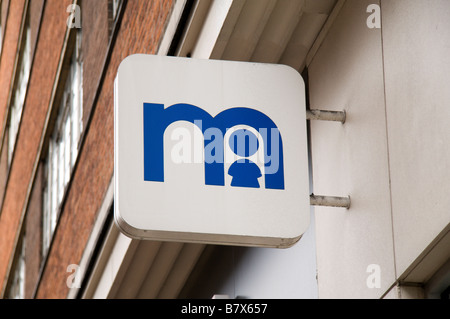 Un negozio segno sopra i I Mothercare shop in Oxford Street, Londra. Gen 2009 Foto Stock