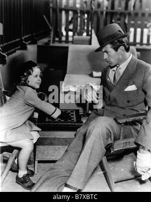 Ora e sempre Anno: 1934 USA Direttore: Henry Hathaway Gary Cooper e Shirley Temple sul set Foto Stock