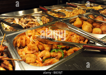 Buffet caldo il cibo in un affollato ristorante Cinese, Bradford West Yorkshire Foto Stock