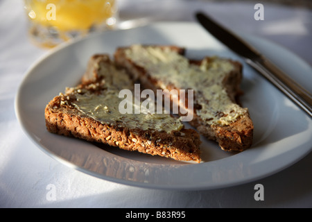 Toast e burro Foto Stock