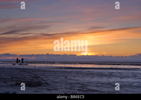 Tramonto sulla baia di Morecambe Foto Stock