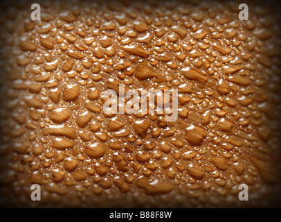 Chiudere l immagine della goccia su uno sfondo di legno Foto Stock