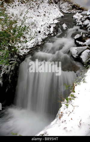 Paesaggio cascata Llanberis neve invernale Llanberis Città Snowdonia National Park North Wales UK Gran Bretagna stagioni forze della natura Foto Stock