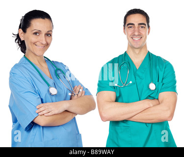 Piccolo gruppo di giovani medici una su sfondo bianco Foto Stock