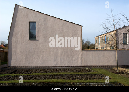 I campi di argilla abbordabili di eco-case di sviluppo, Elmswell, Suffolk, Regno Unito. Foto Stock