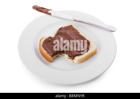 Nocciola e Cioccolato da spalmare su una fetta di pane Foto Stock