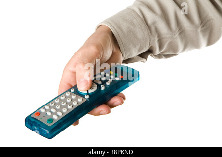 Mano utilizzando un telecomando del televisore Foto Stock