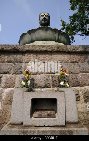 Statua di Buddha. Gokoku-ji tempio complesso. Bunkyo-ku. Tokyo. Giappone Foto Stock