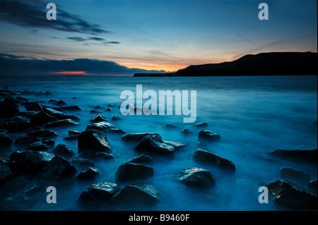 Tramonto sulla baia di Kimmeridge Foto Stock