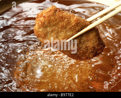 Impanati costoletta di maiale Foto Stock