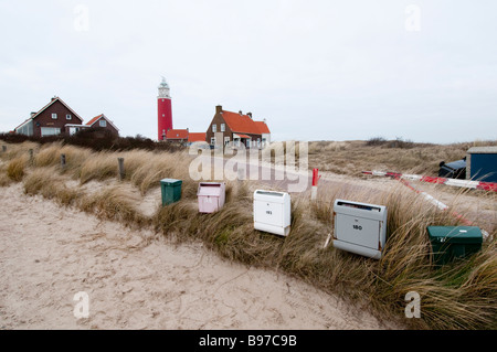 Una fila di caselle di posta su Texel vicino al faro Foto Stock