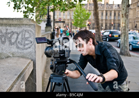 Un cameraman in Londra Foto Stock