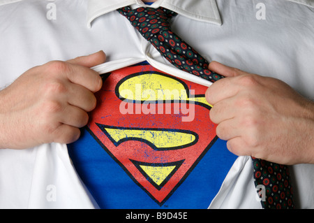 Imprenditore rivelando un logo di Superman Foto Stock