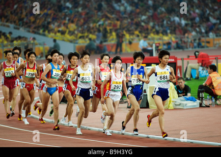 Cina, Pechino. Atleti impegnati durante il 2008 la Cina apre le gare di atletica Foto Stock