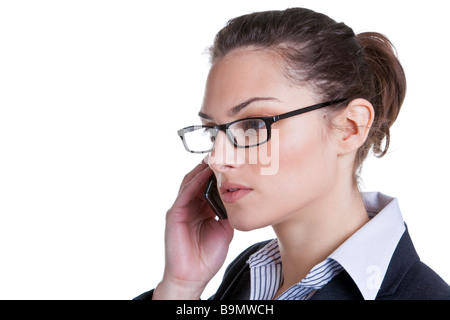 Attraente imprenditrice facendo una telefonata isolati su sfondo bianco Foto Stock