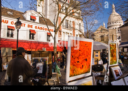 Artista pittura nella strada vicino alla Basilica del Sacre Coeur, Montmartre, Parigi, Francia, Europa Foto Stock