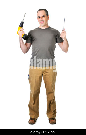 Fiducioso tuttofare tenendo un trapano e cacciavite Foto Stock