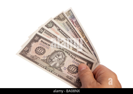 Maschio di denaro mano azienda manciata di moneta ecuadoriana Foto Stock
