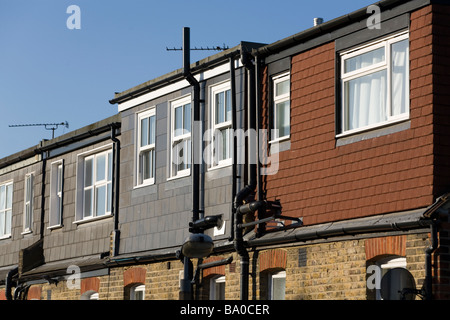 Dormer estensione del tetto aggiunte dormer / / / dormas dorma estensioni di tetti a terrazza Casa / Case a schiera a Twickenham. Regno Unito Foto Stock