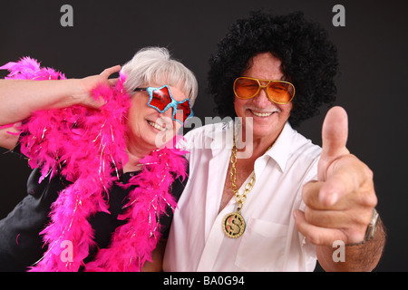 Coppia senior vestito in costume Foto Stock