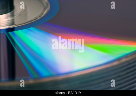 Pila di dischi compatti che brilla in luce Foto Stock
