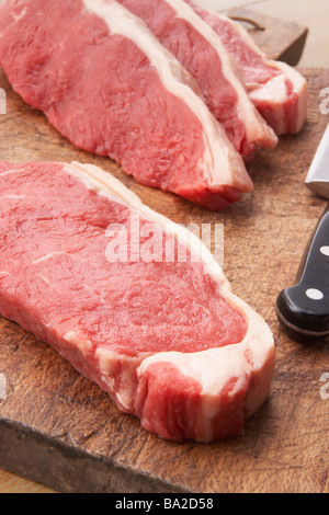 Tagliata sul tagliere di legno Foto Stock