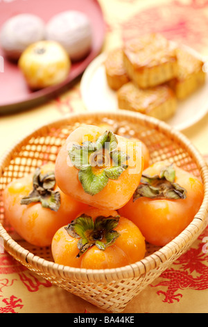 Cachi e mooncakes Foto Stock